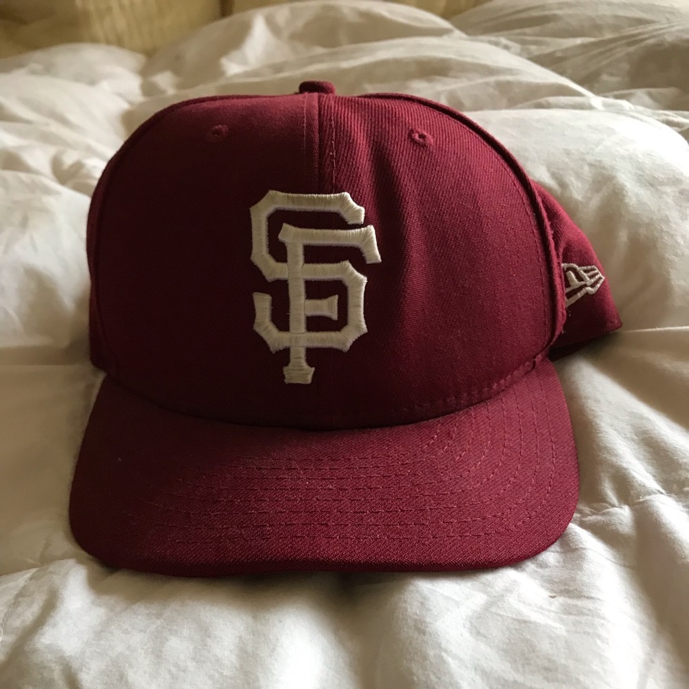 San Francisco Giants baseball hat.
